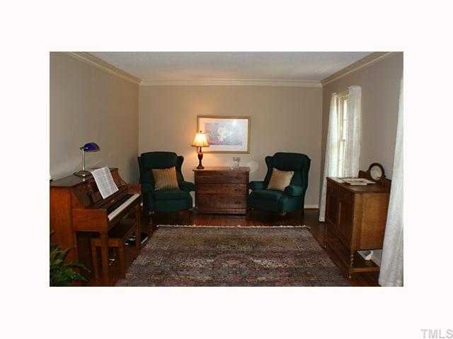 1413 Falls Church Road Raleigh, NC 27609 - Photo 5 of 12 a living room with furniture