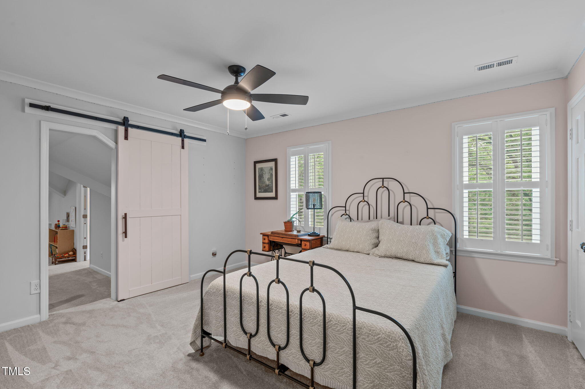 8505 Stonegate Drive Raleigh, NC 27615 - Photo 18 of 32 a bedroom with bed and a window