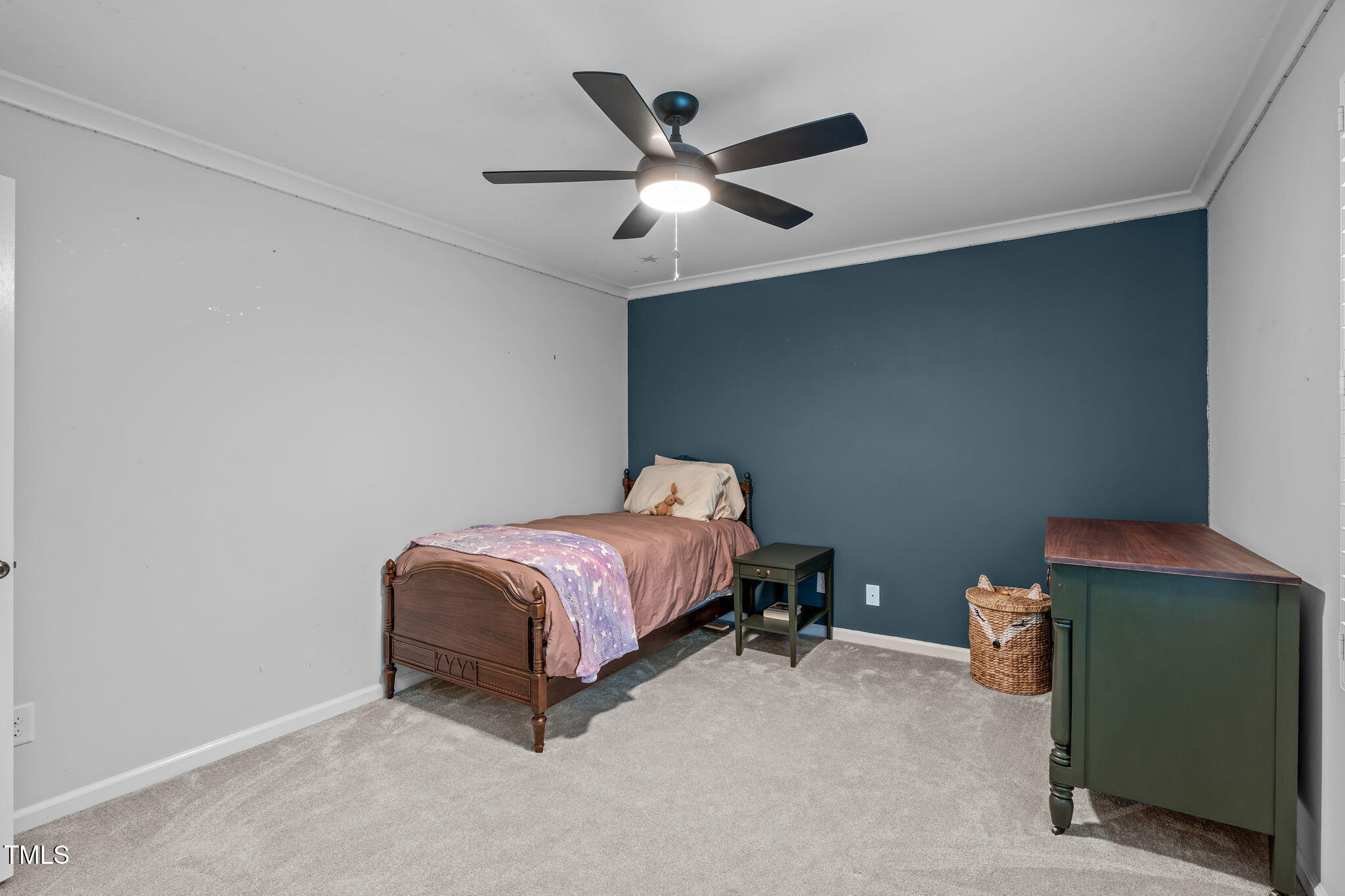 8505 Stonegate Drive Raleigh, NC 27615 - Photo 22 of 32 a bed room with a bed and a ceiling fan