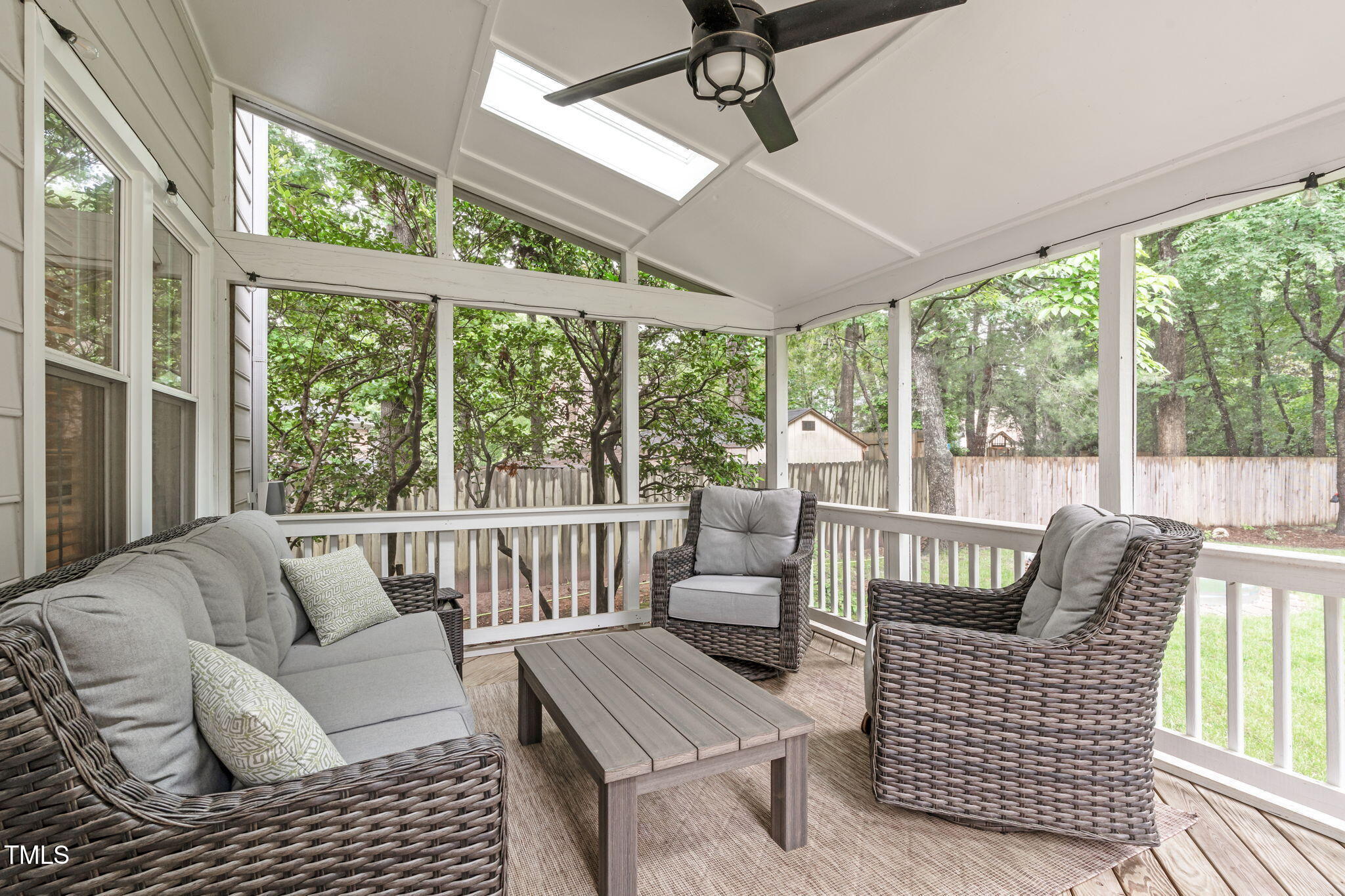 8505 Stonegate Drive Raleigh, NC 27615 - Photo 25 of 32 a living room with furniture and a large window