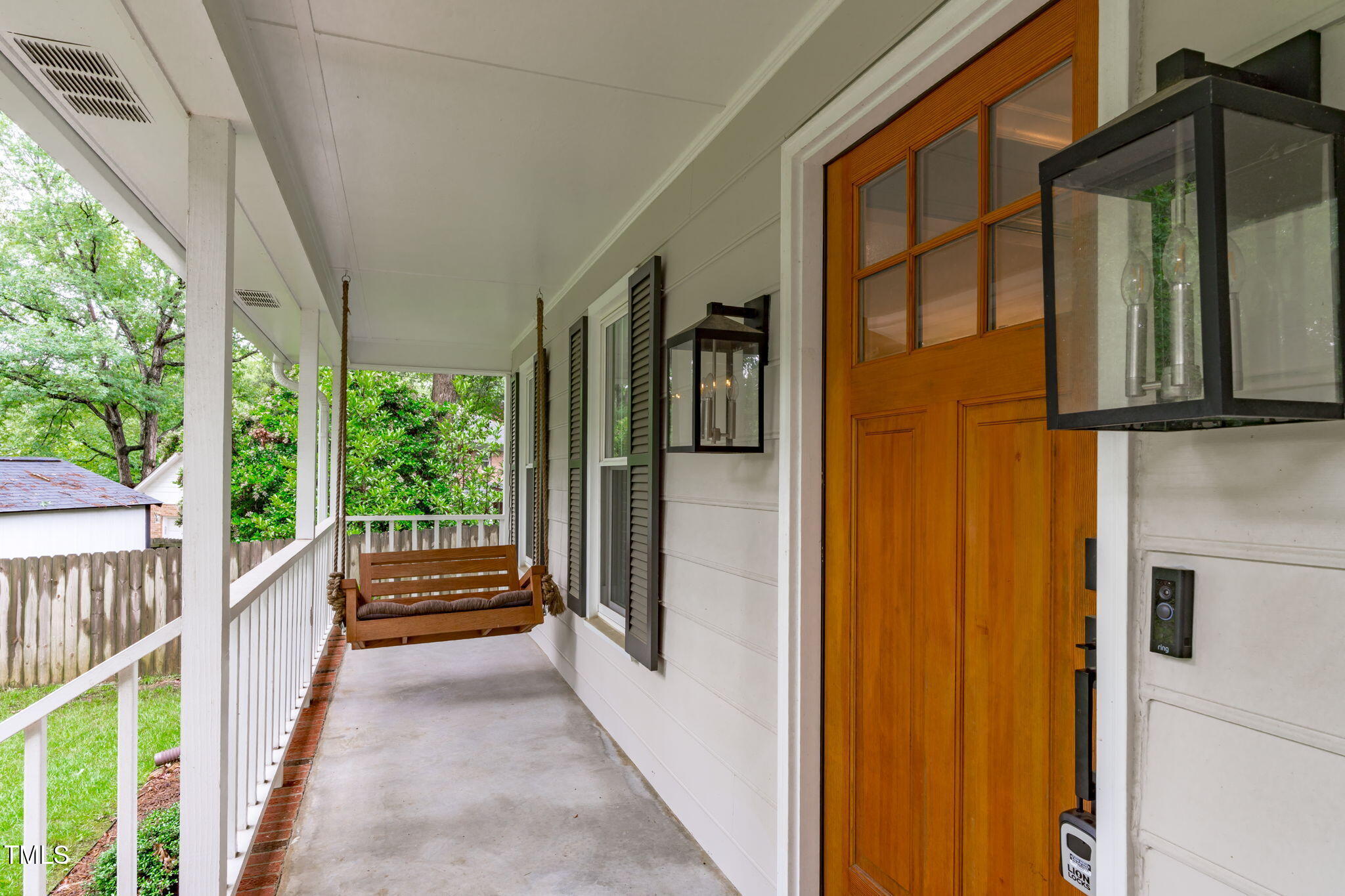 8505 Stonegate Drive Raleigh, NC 27615 - Photo 3 of 32 a view of a house with a porch