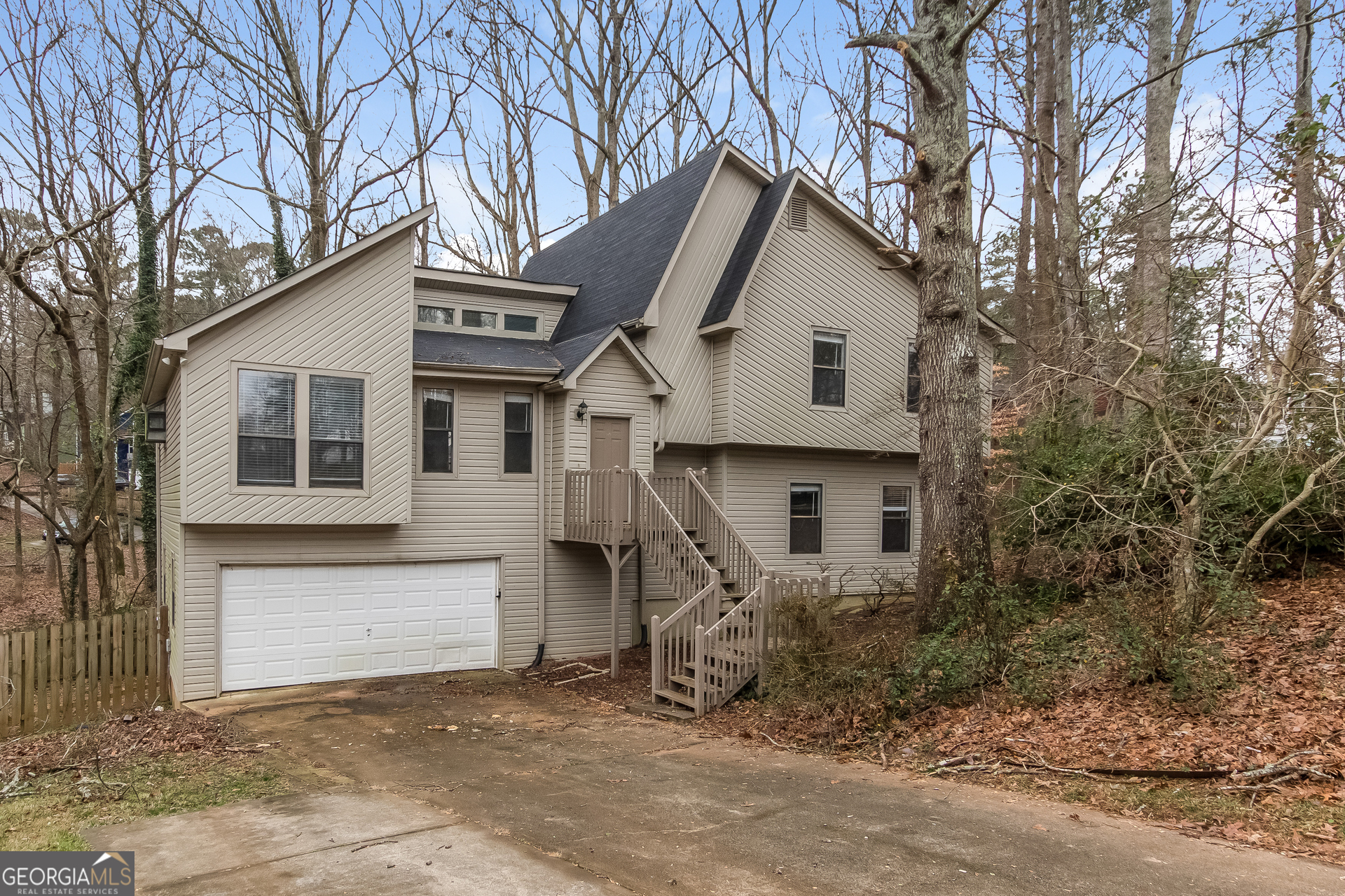 1038 Summer Place Northwest Acworth, GA 30102 - Photo 1 of 15 a front view of house with yard and trees around