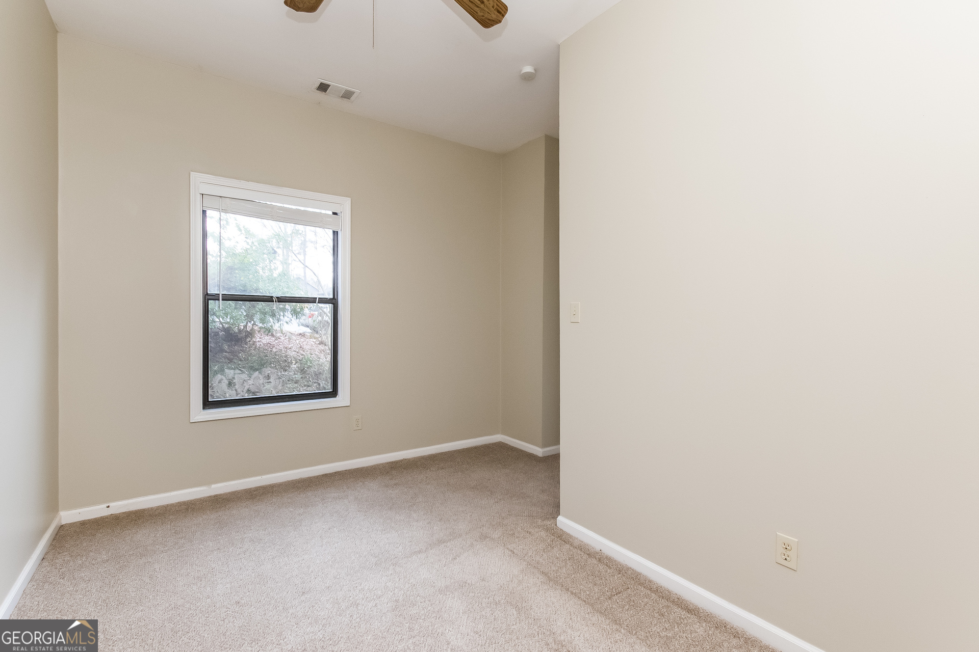 1038 Summer Place Northwest Acworth, GA 30102 - Photo 11 of 15 an empty room with windows