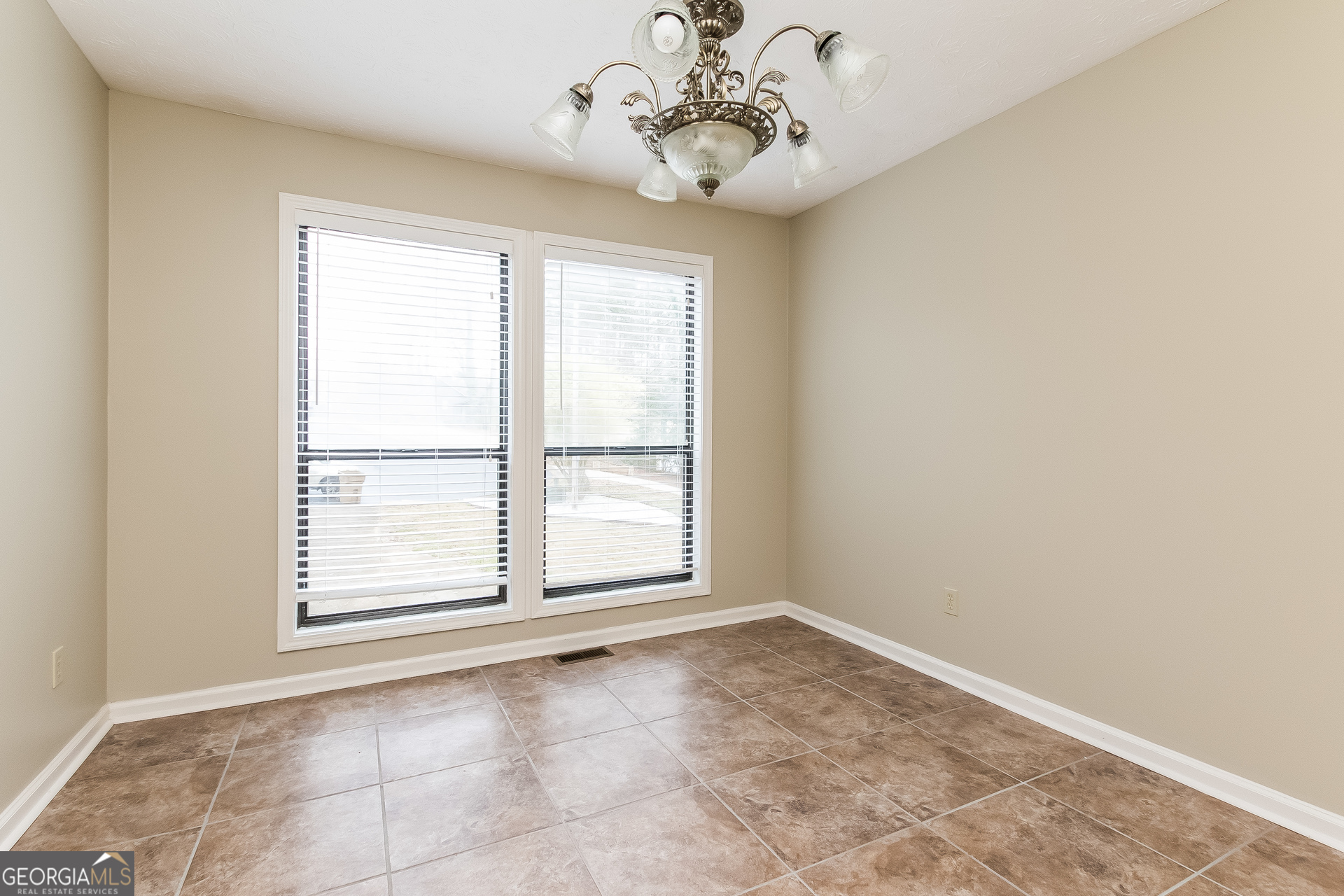1038 Summer Place Northwest Acworth, GA 30102 - Photo 4 of 15 an empty room with windows