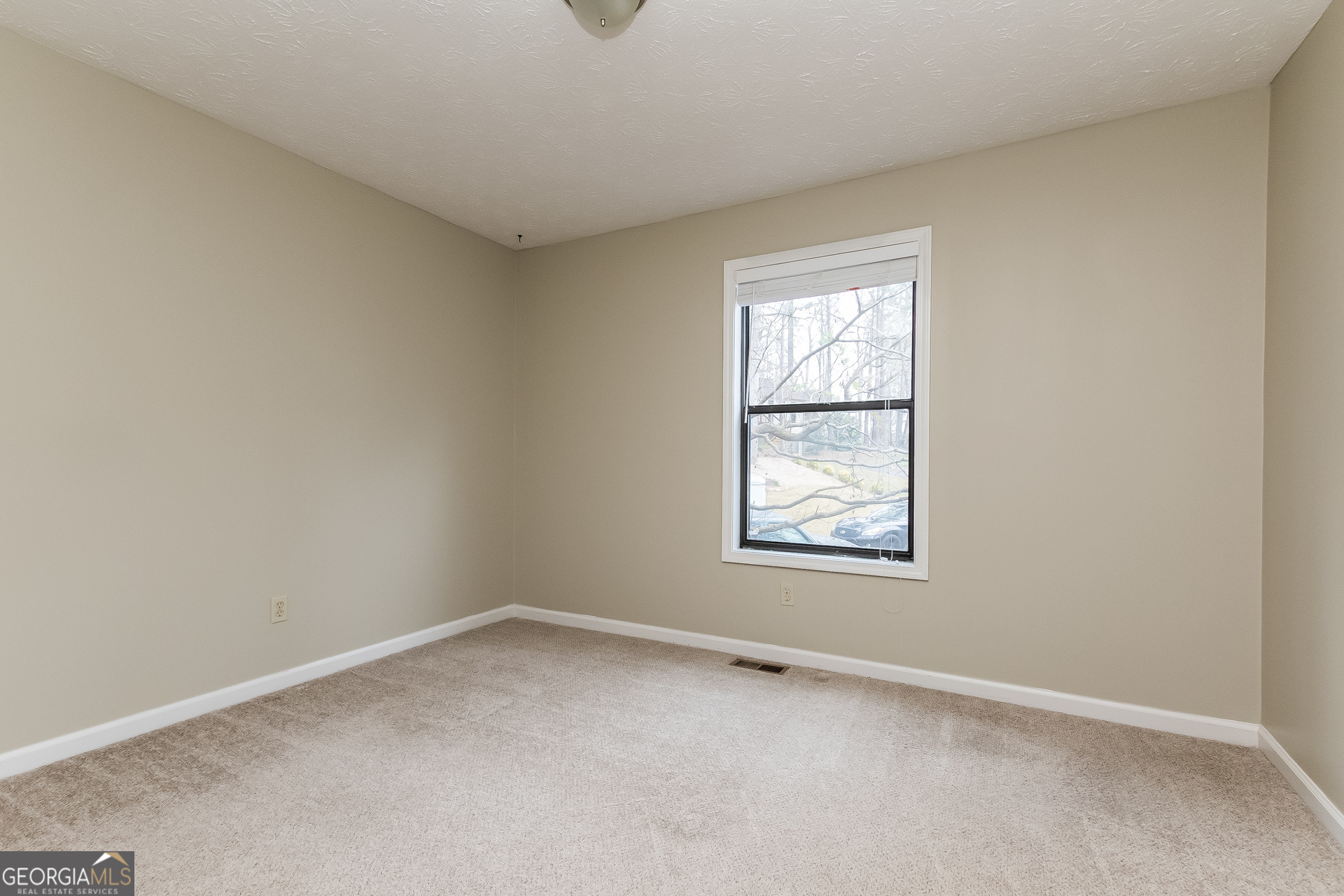 1038 Summer Place Northwest Acworth, GA 30102 - Photo 10 of 15 an empty room with a window