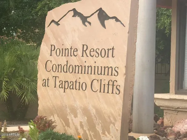 a sign that is on the side of a building