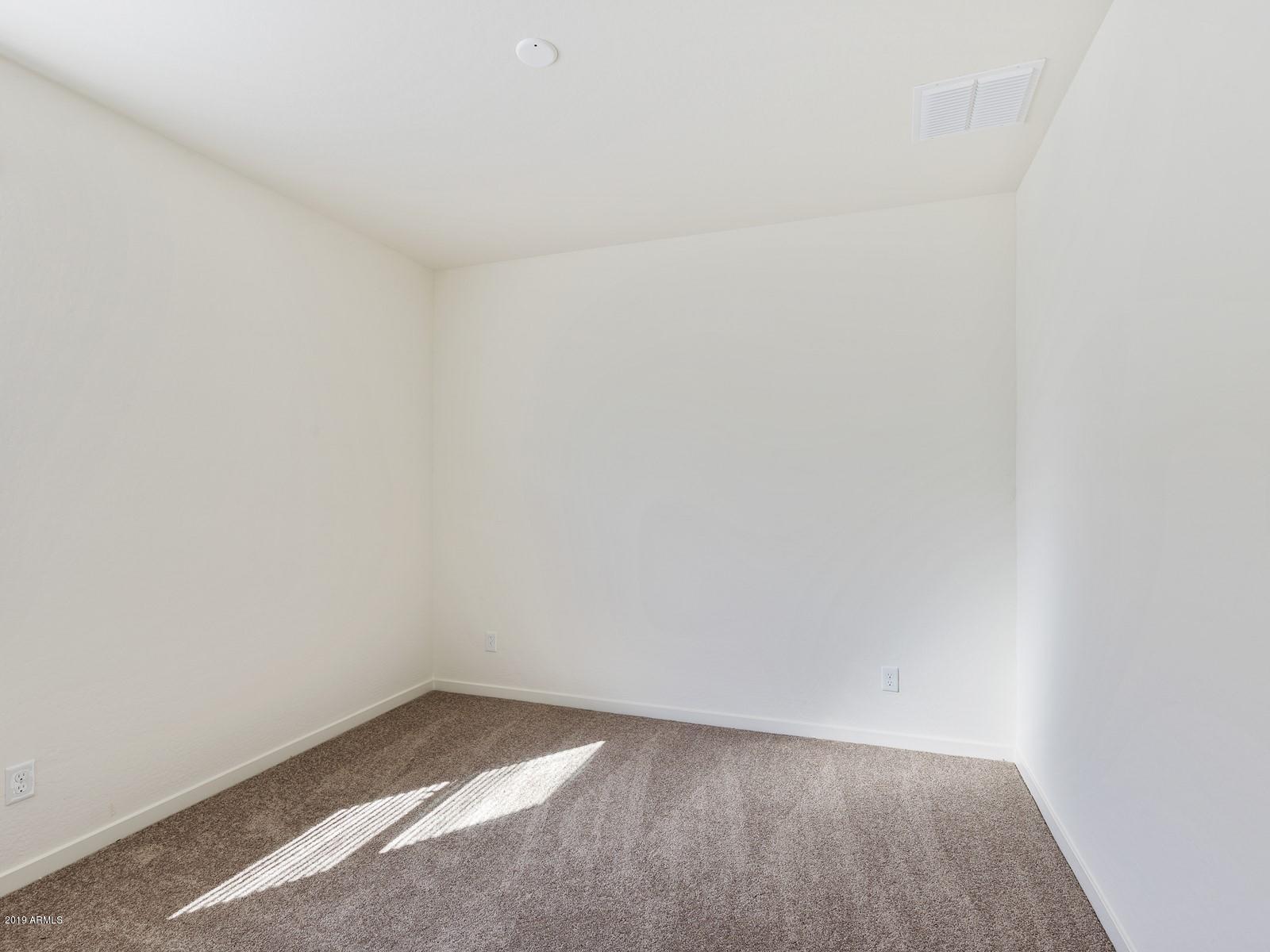 9822 West Trumbull Road Tolleson, AZ 85353 - Photo 11 of 15 013_Guest Room