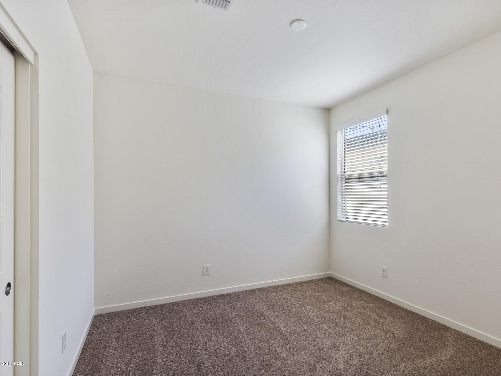 9822 West Trumbull Road Tolleson, AZ 85353 - Photo 12 of 15 014_Guest Room