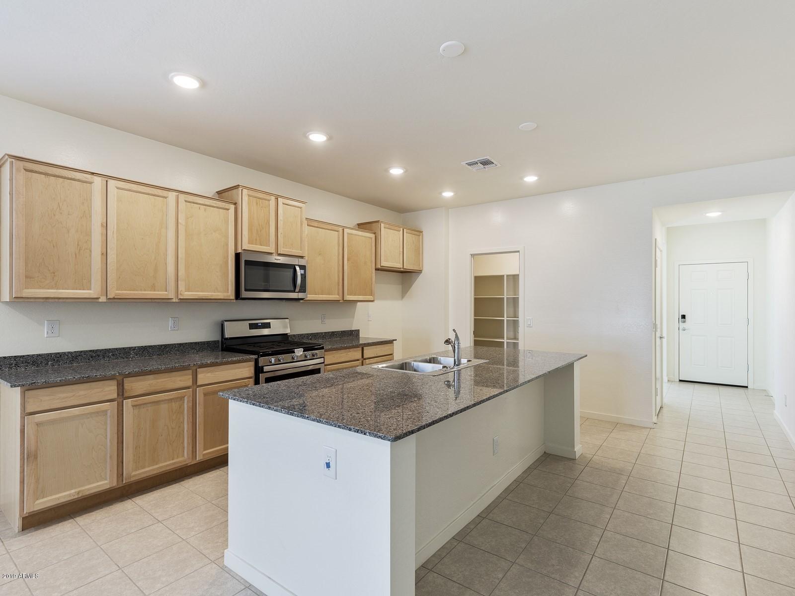 9822 West Trumbull Road Tolleson, AZ 85353 - Photo 4 of 15 006_Kitchen