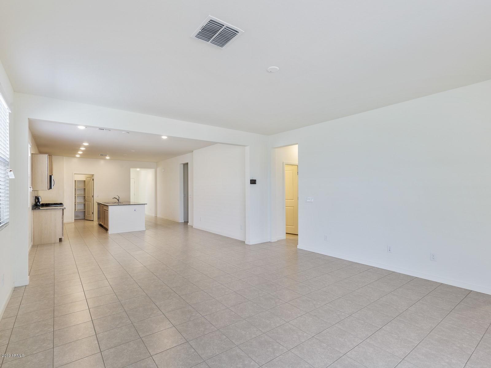 9822 West Trumbull Road Tolleson, AZ 85353 - Photo 6 of 15 008_Living Room