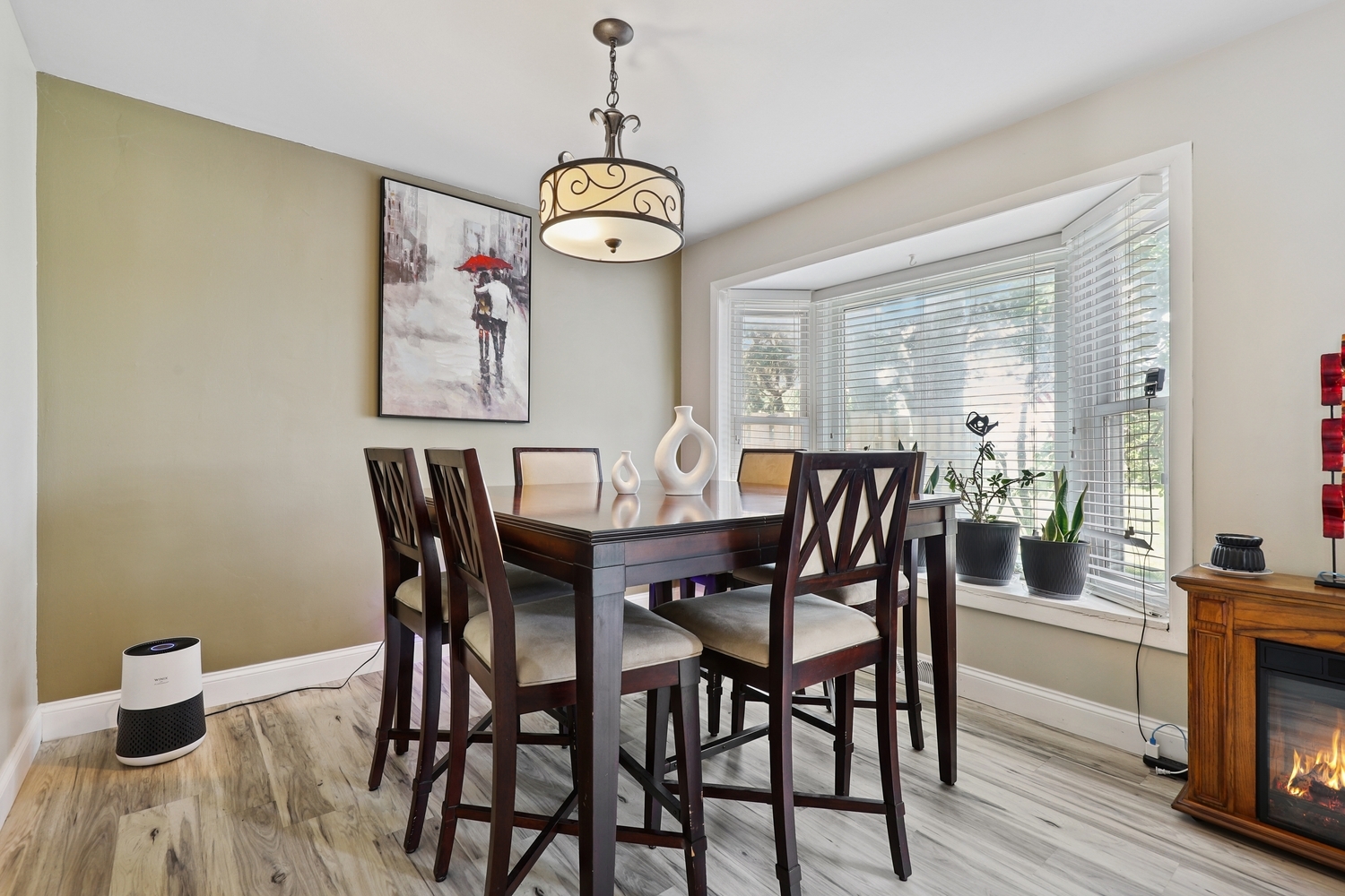 179 Roberts Road Bolingbrook, IL 60440 - Photo 5 of 20 a view of a dining room with furniture window and wooden floor