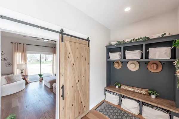 a view of kitchen with furniture and wooden floor