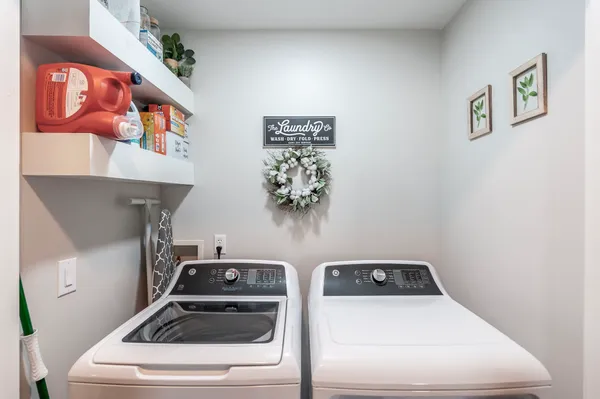 a utility room with dryer and washer