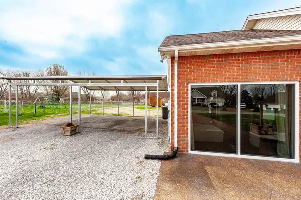 a view of a house with a park