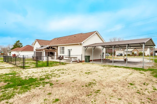 a house with yard in front of it
