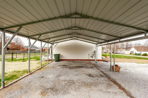 a view of a backyard of the house