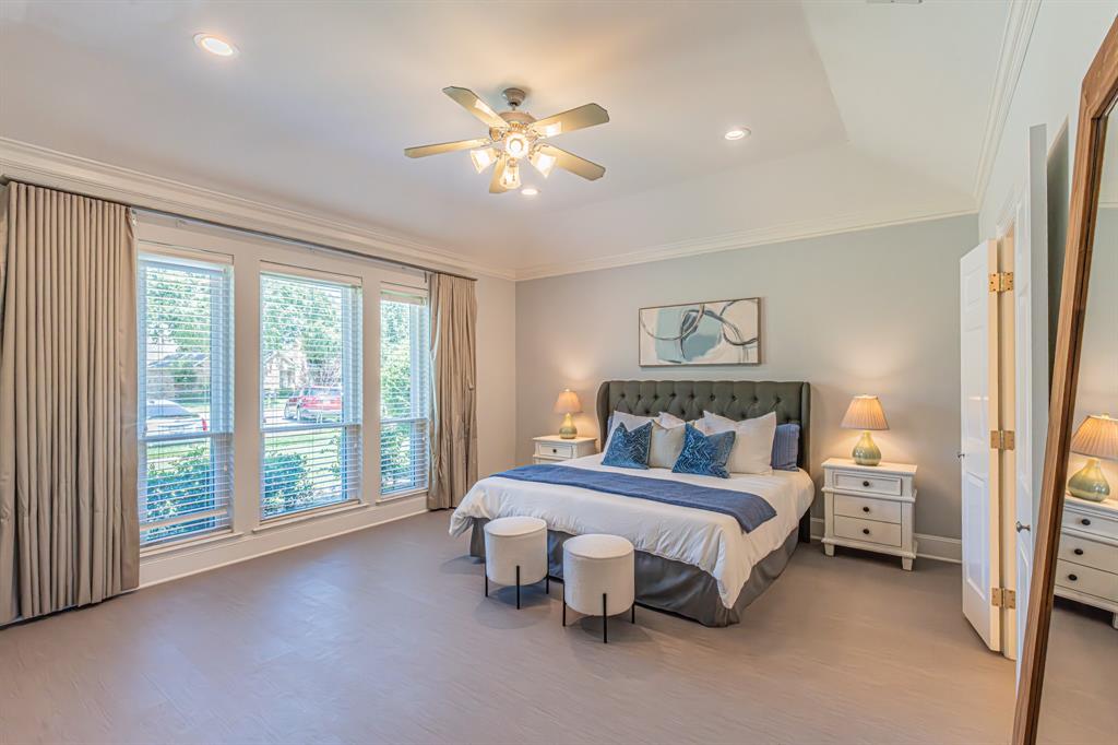 300 Sundance Circle Irving, TX 75063 - Photo 12 of 39 Vaulted ceiling bedroom with wood-finish flooring