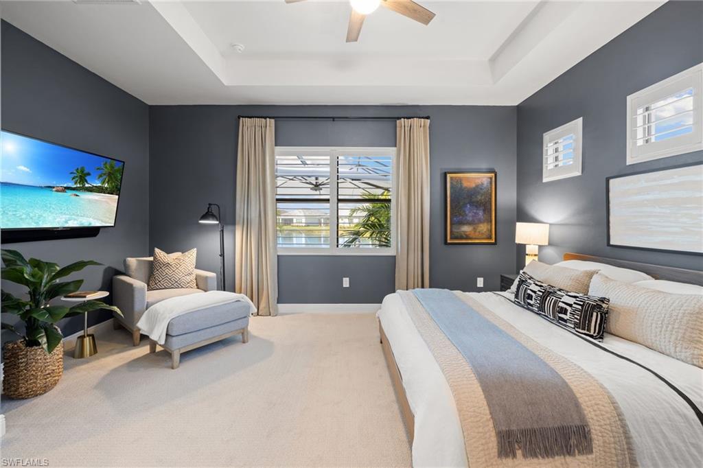 3967 Pegasus Way Naples, FL 34120 - Photo 14 of 50 a bedroom with a bed and a couch