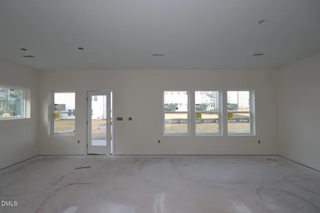 an empty room with windows