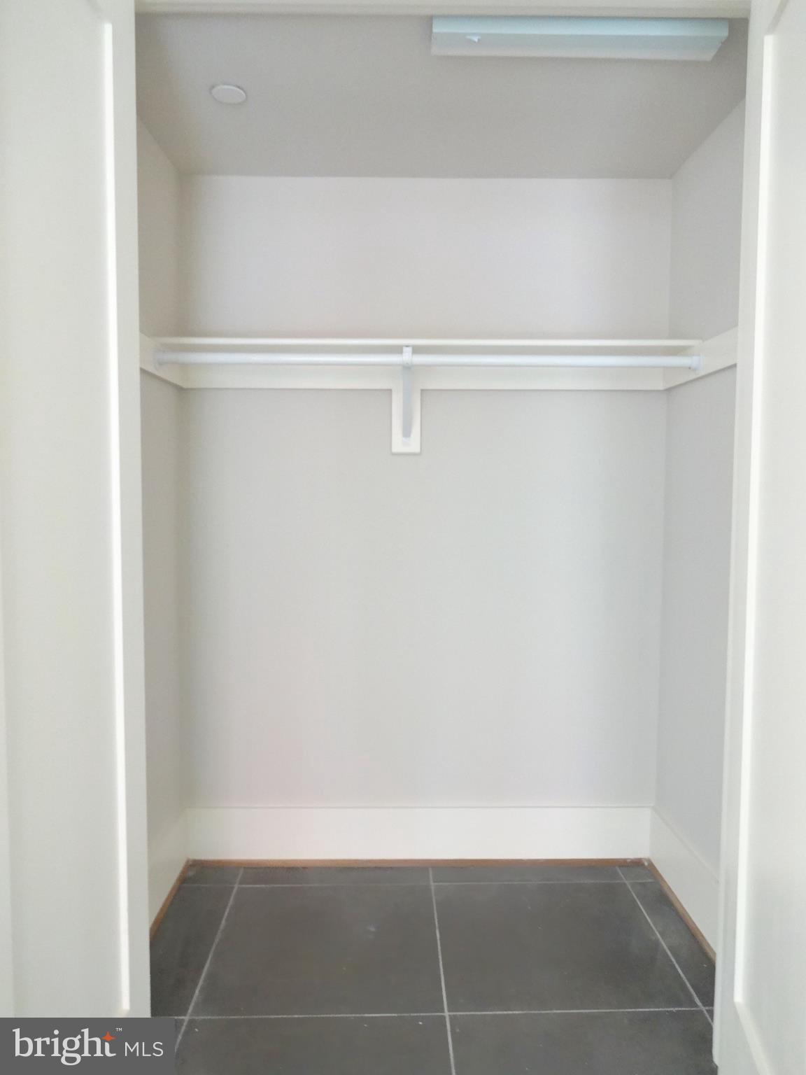 1311 Pennsylvania Ave. Southeast, Unit B Washington, DC 20003 - Photo 5 of 5 a view of a room with racks on the wall