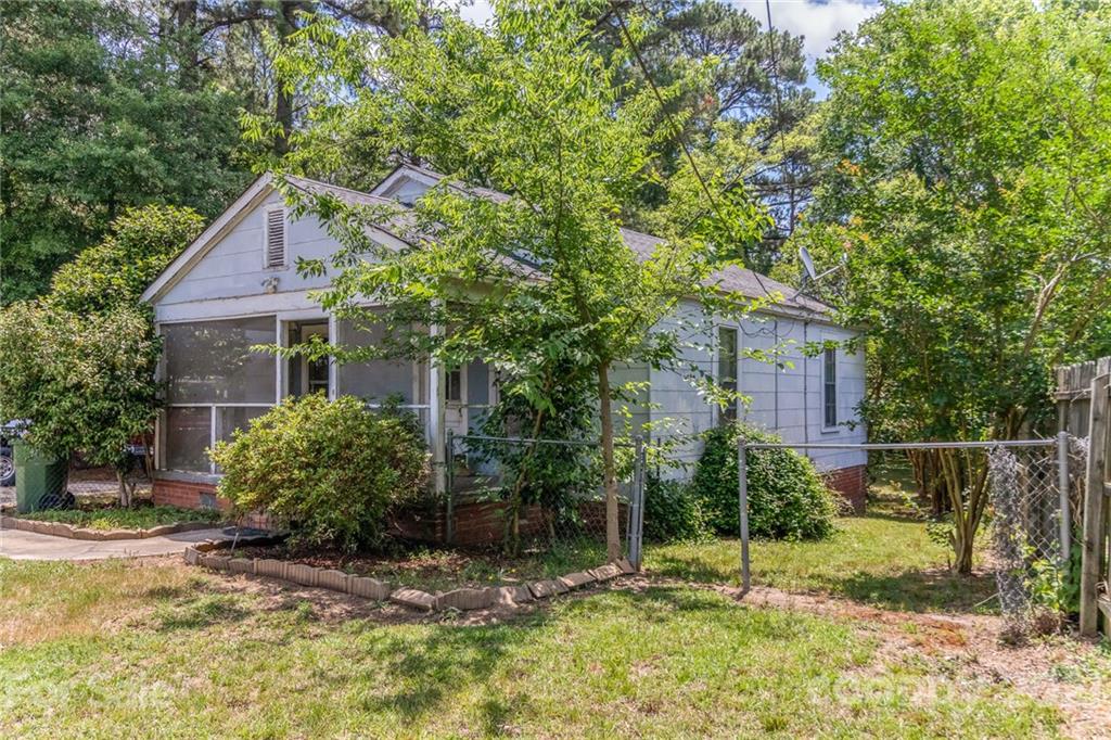 507 State Rd S-29-70 Lancaster, SC 29720 - Photo 21 of 27 a house view with a backyard space