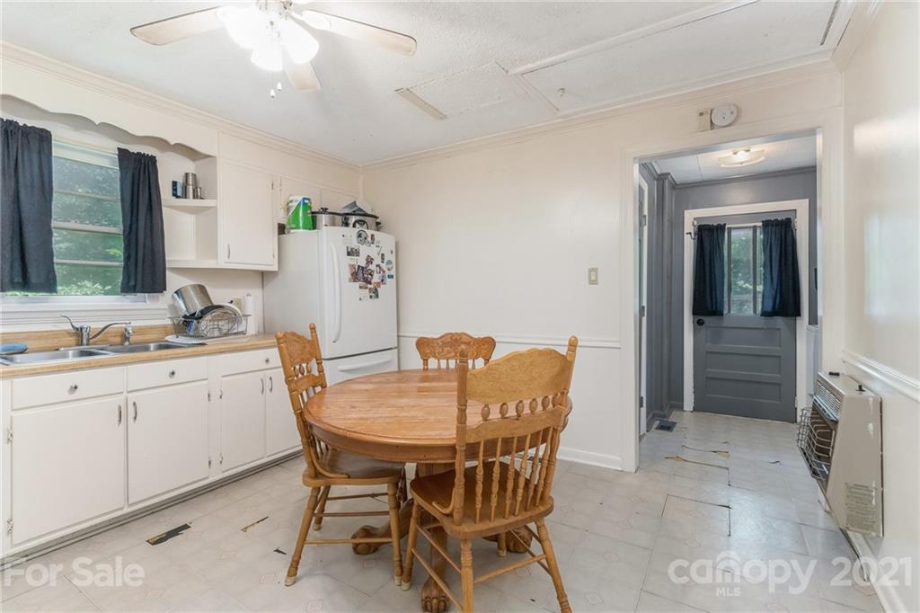 507 State Rd S-29-70 Lancaster, SC 29720 - Photo 6 of 27 a dining room with furniture and window