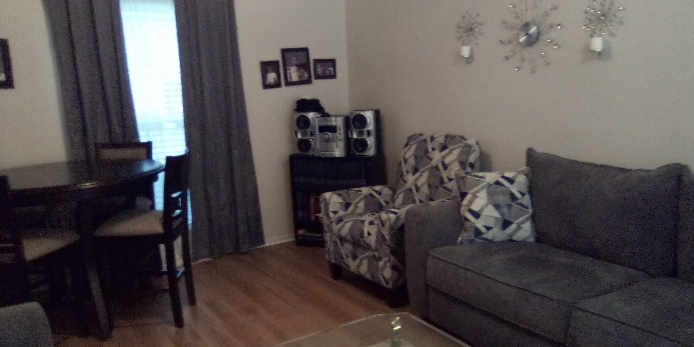 16161 Tiger Bend Road Baton Rouge, LA 70817 - Photo 15 of 17 a living room with furniture and a window