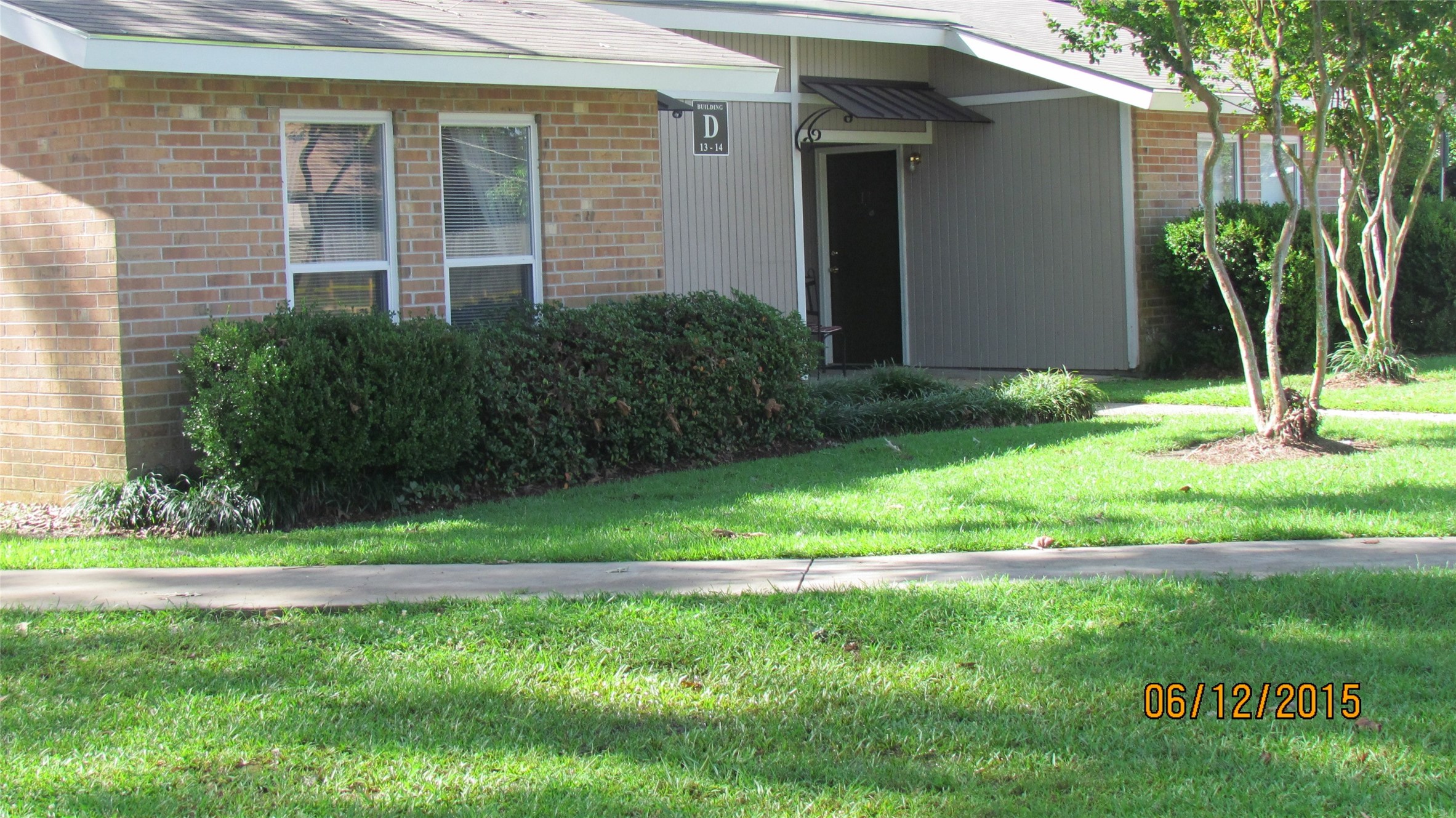 16161 Tiger Bend Road Baton Rouge, LA 70817 - Photo 2 of 17 a house view with a garden space