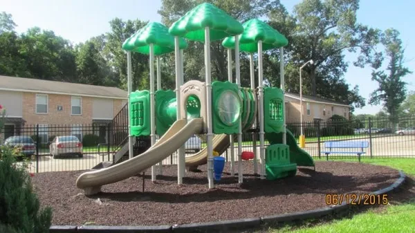 a view of a park with swings