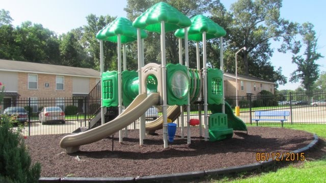 16161 Tiger Bend Road Baton Rouge, LA 70817 - Photo 9 of 17 a view of a park with swings