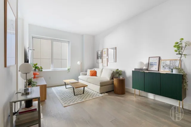 a picture of a park with a bench