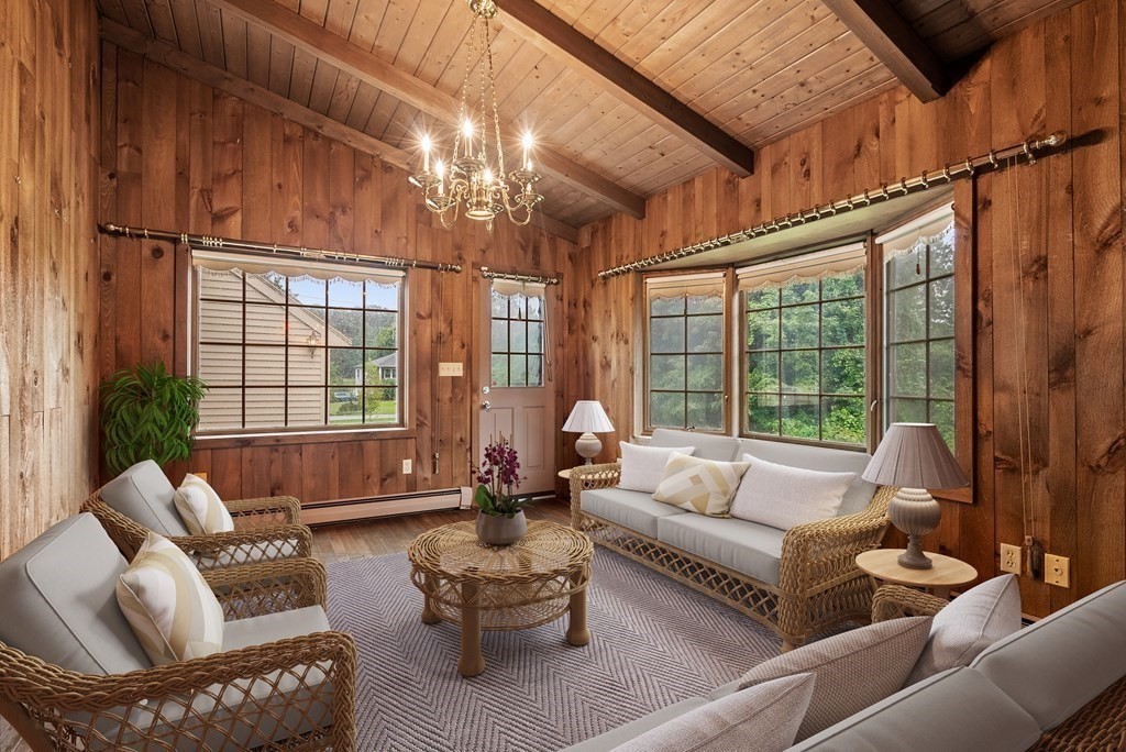 4 Woodpark Circle Lexington, MA 02421 - Photo 12 of 27 a living room with furniture and a large window
