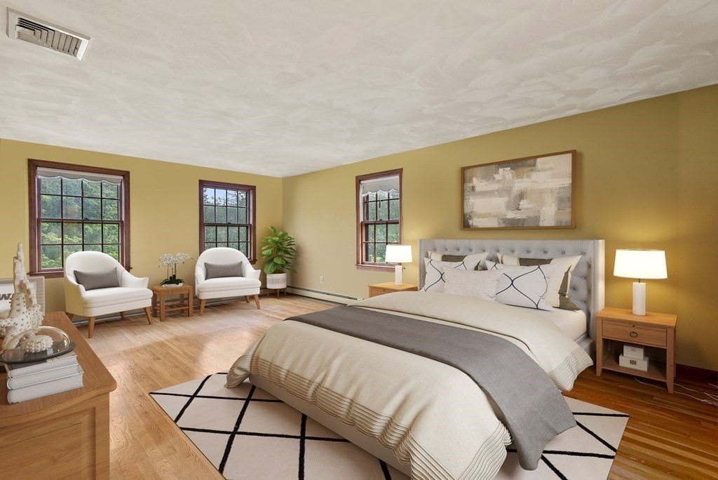 4 Woodpark Circle Lexington, MA 02421 - Photo 16 of 27 a spacious bedroom with a bed and glass walk in closet