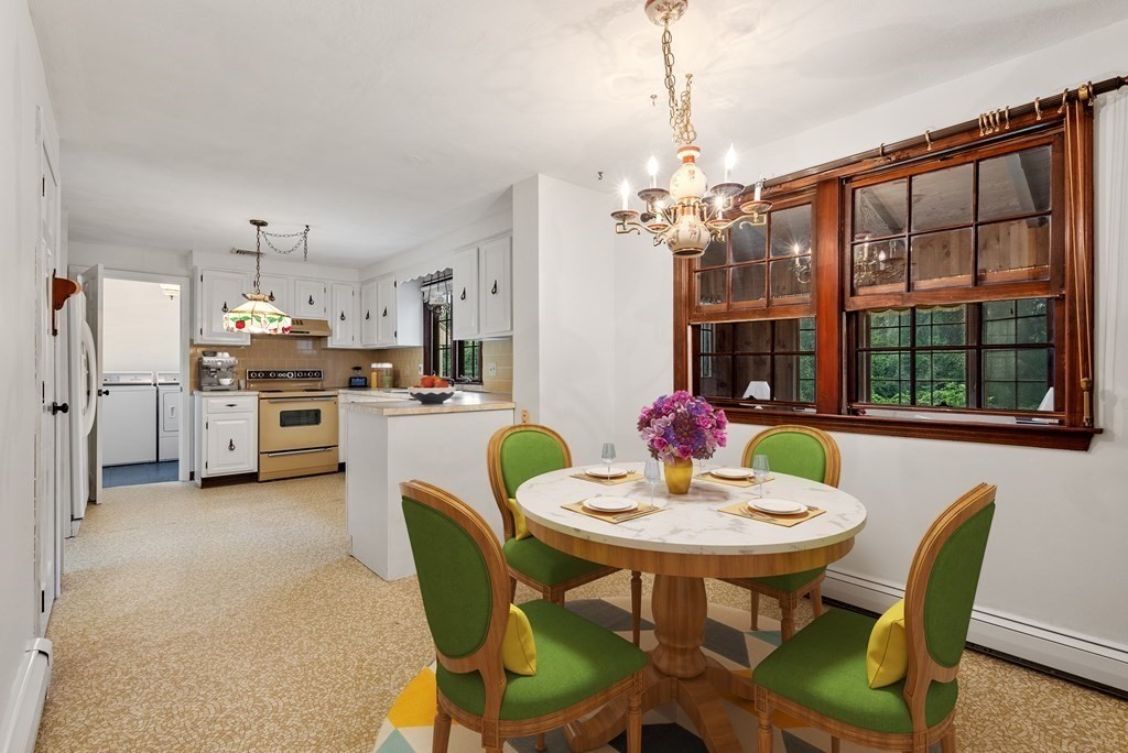 4 Woodpark Circle Lexington, MA 02421 - Photo 8 of 27 a view of a dining room with furniture window and outside view