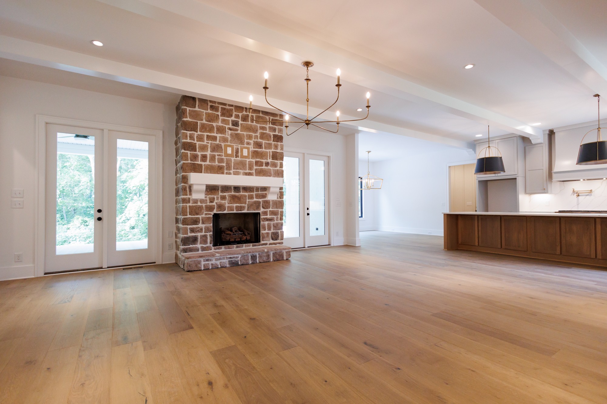 463 Bethlehem Road Lebanon, TN 37087 - Photo 19 of 48 an empty room with windows fireplace and wooden floor
