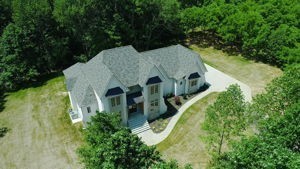 463 Bethlehem Road Lebanon, TN 37087 - Photo 46 of 48 an aerial view of a house with a yard and trees all around
