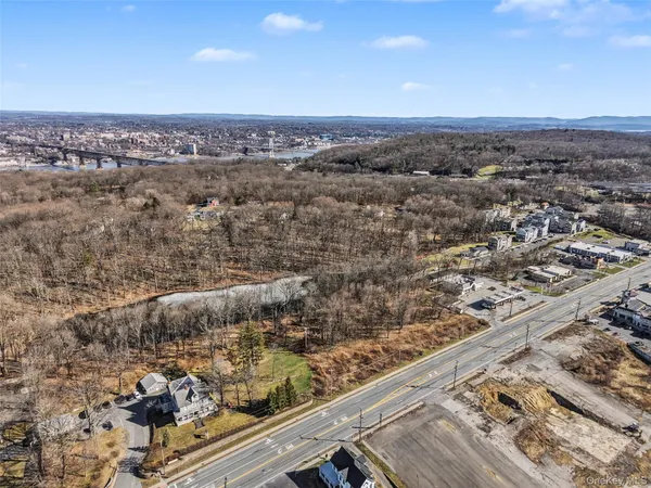 an aerial view of house with yard