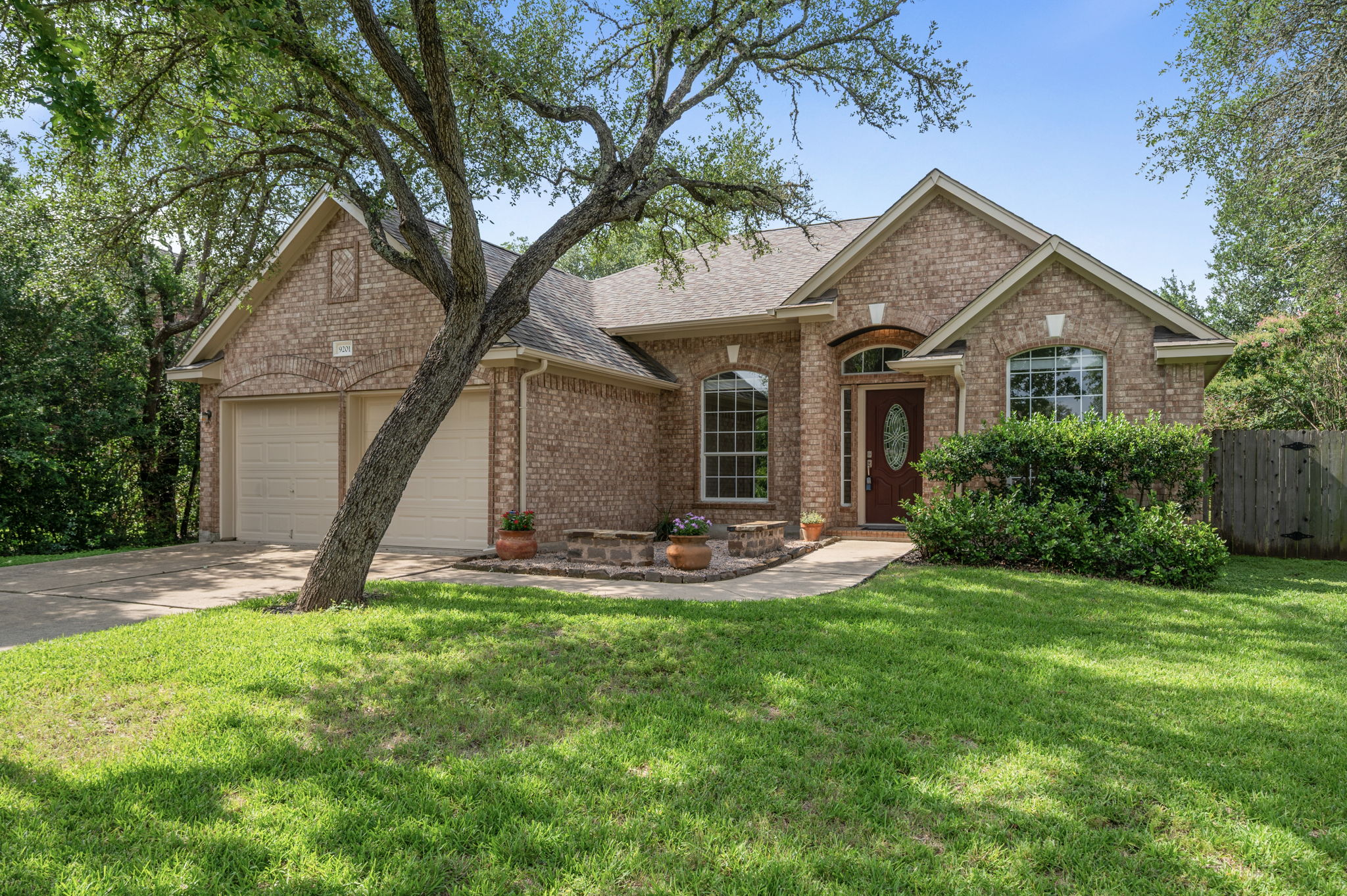 9201 La Siesta Bend Austin, TX 78749 - Photo 1 of 37 a view of a house with a yard and tree