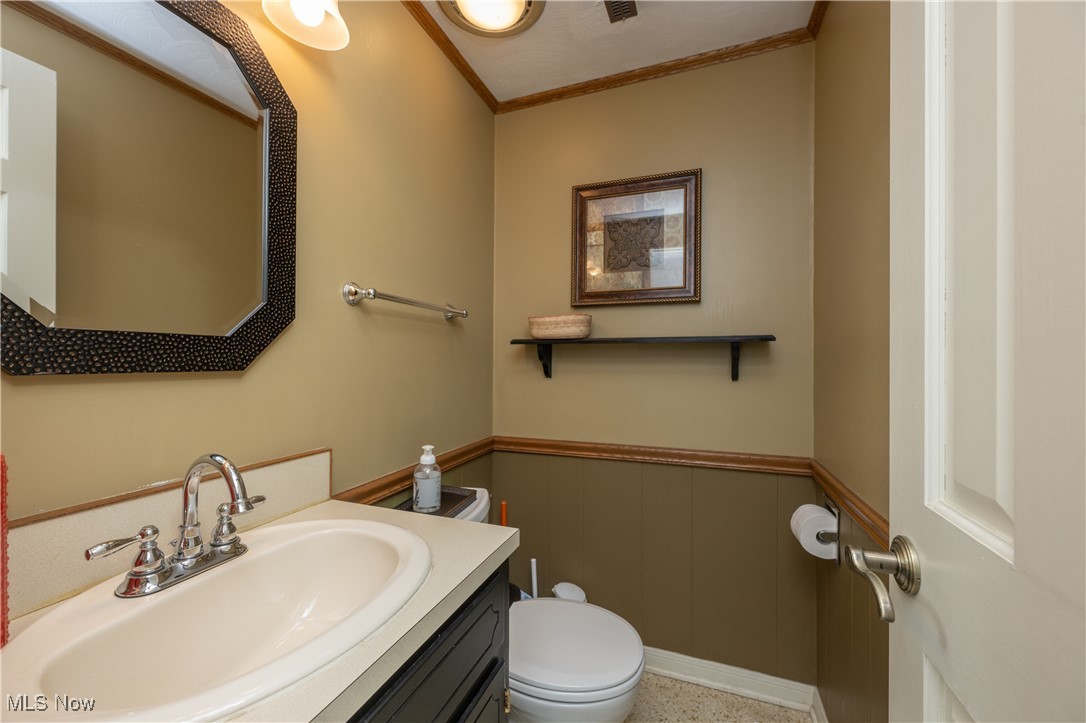 3721 20th Street Northwest Canton, OH 44708 - Photo 25 of 47 Bathroom featuring vanity, crown molding, and toilet