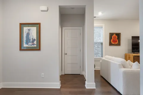 a view of a livingroom with furniture and windows
