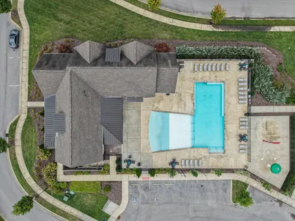 swimming pool view with a outdoor seating
