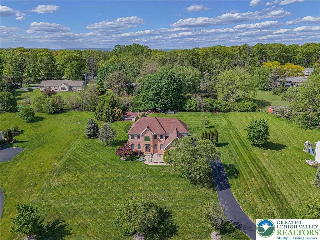 6551 Overlook Road Orefield, PA 18069 - Photo 2 of 82 an aerial view of a house with a yard