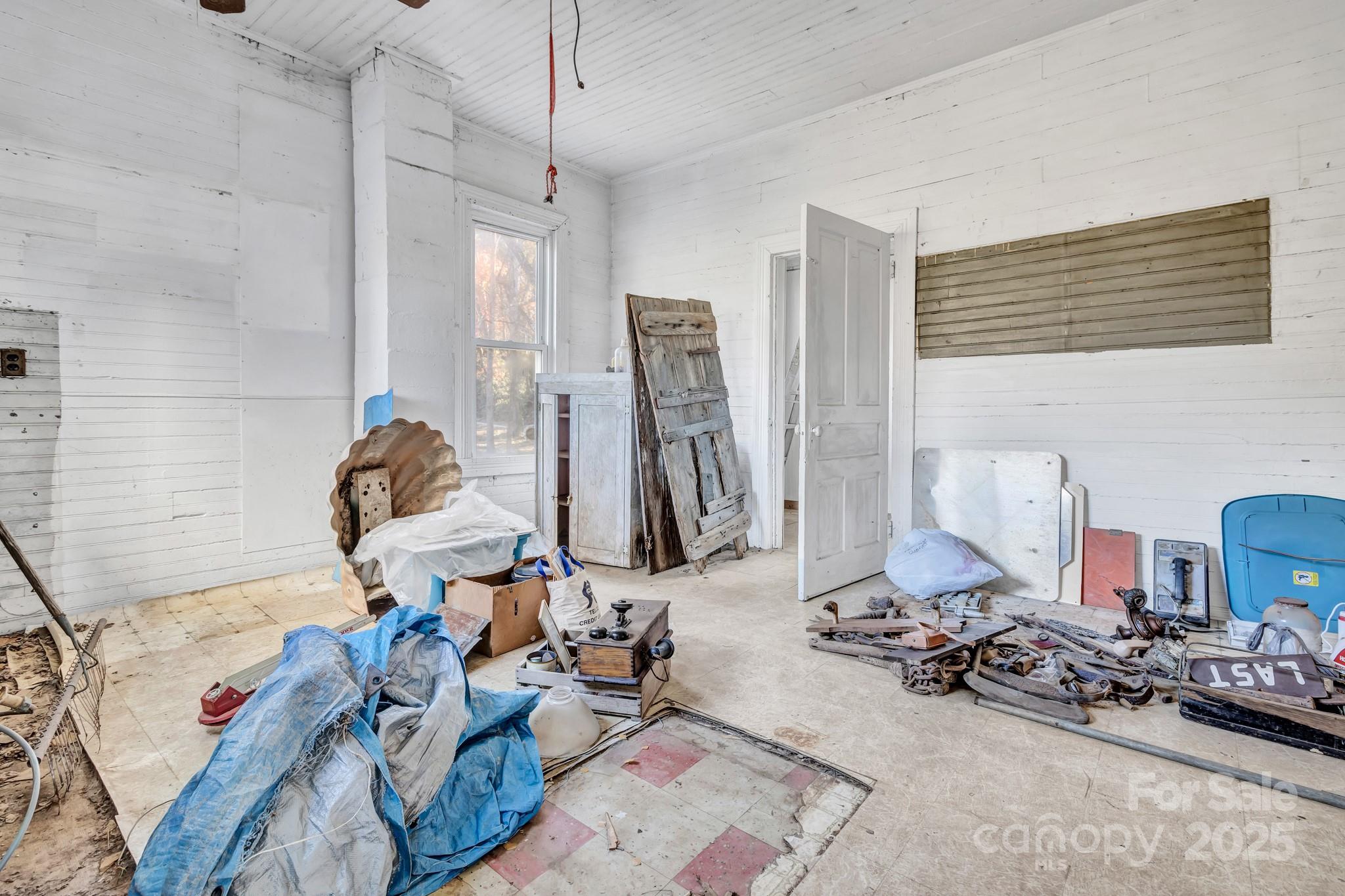 143 Sharon Road Fairview, NC 28730 - Photo 13 of 36 a room with gym equipment and a mirror