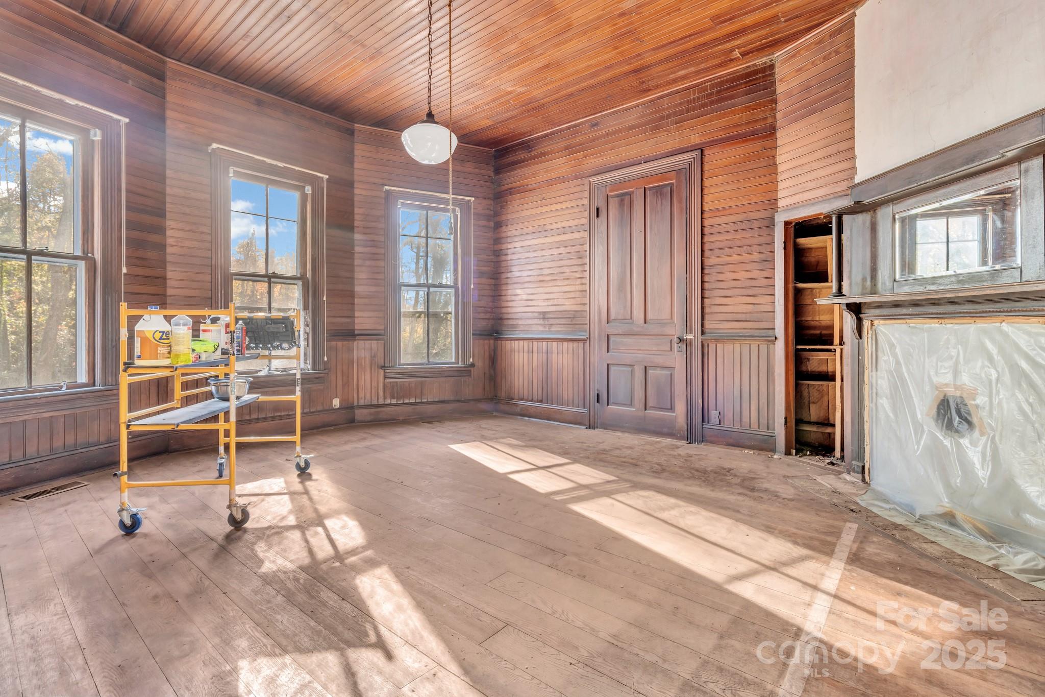 143 Sharon Road Fairview, NC 28730 - Photo 15 of 36 a view of empty room with windows