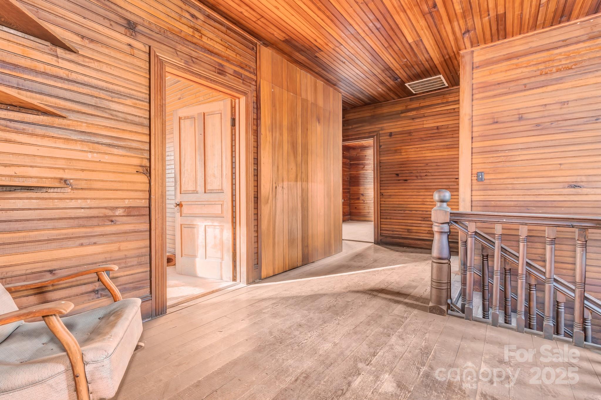 143 Sharon Road Fairview, NC 28730 - Photo 27 of 36 a view of a backyard with wooden fence
