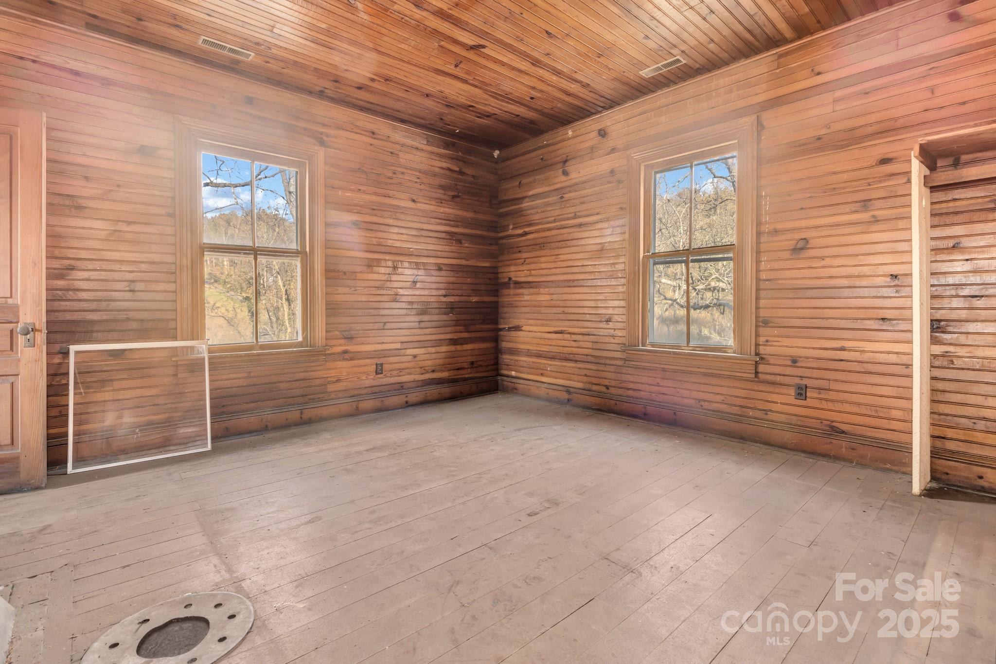 143 Sharon Road Fairview, NC 28730 - Photo 29 of 36 a view of an empty room with a window