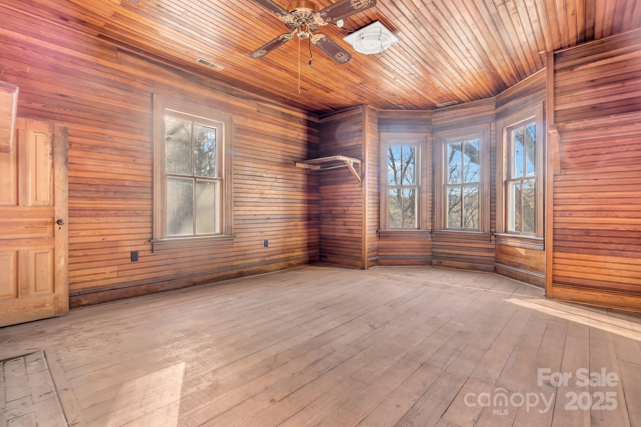 143 Sharon Road Fairview, NC 28730 - Photo 33 of 36 an empty room with windows