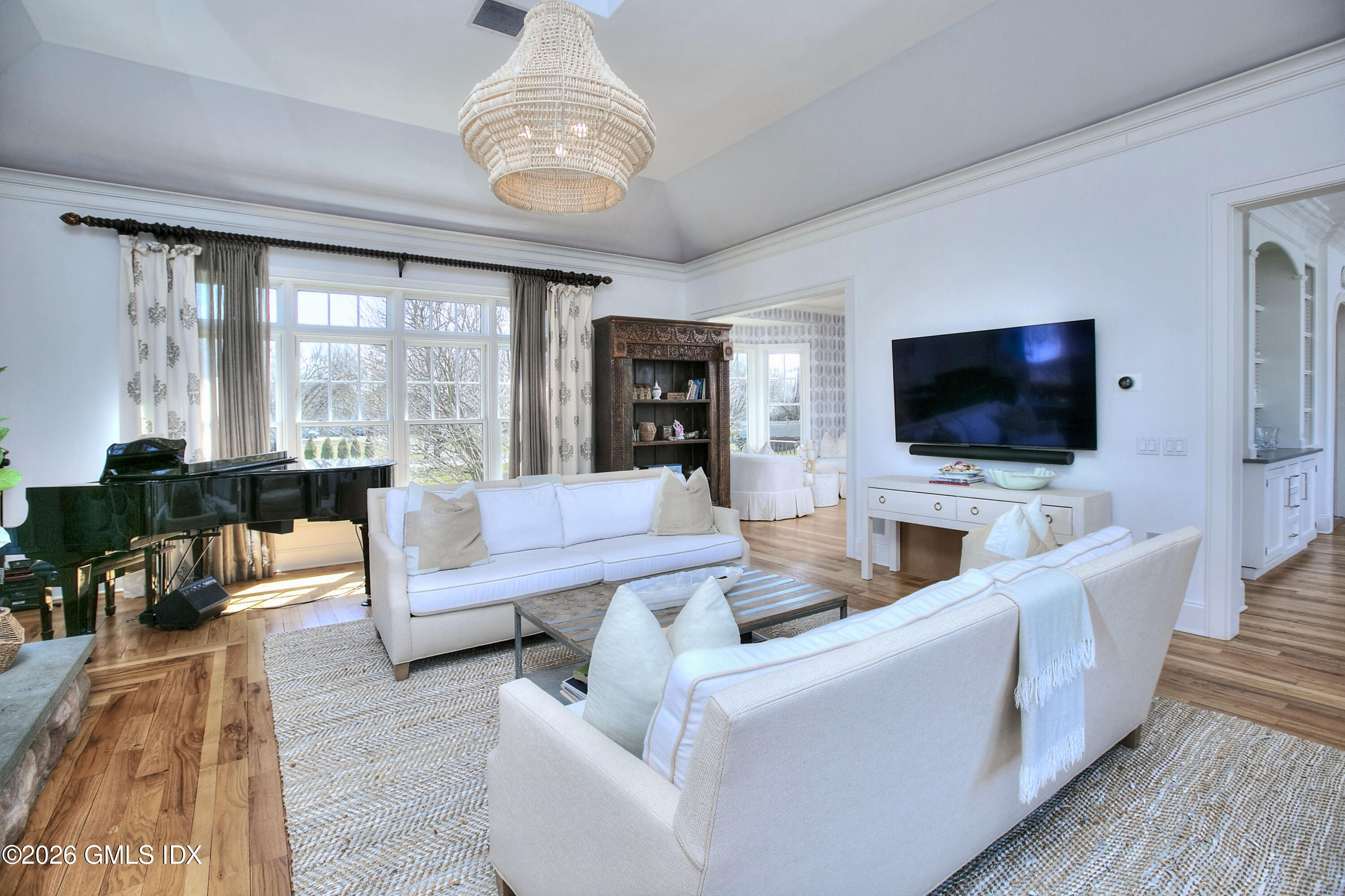 3 Shorehaven Road Norwalk, CT 06855 - Photo 18 of 40 a living room with furniture and a flat screen tv