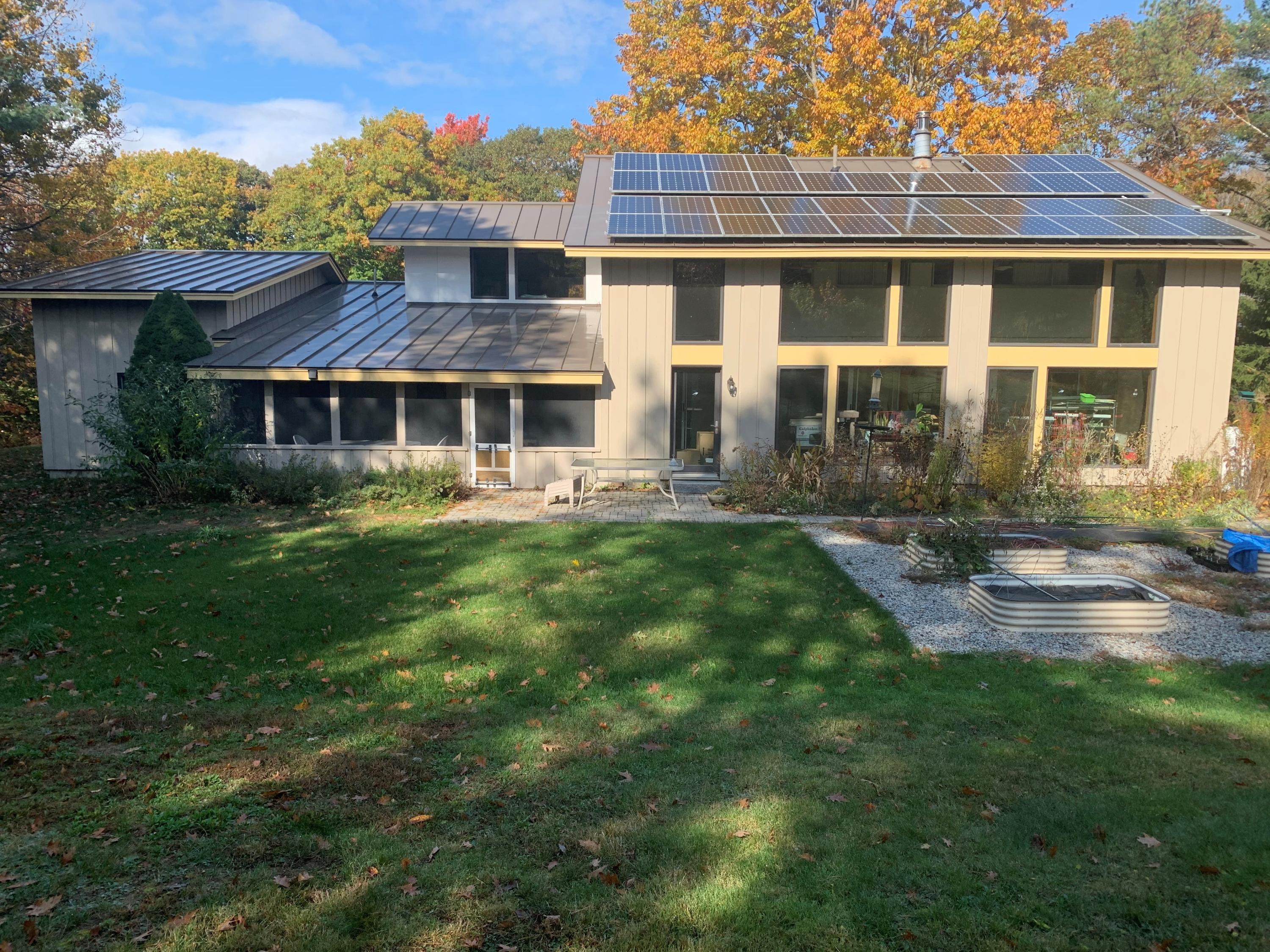 16 Sylvan Road Scarborough, ME 04074 - Photo 40 of 42 Solar PV panels create electicity