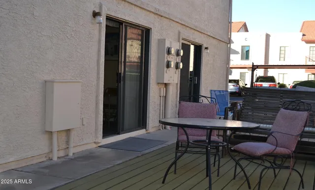 a view of a chairs and table in a room
